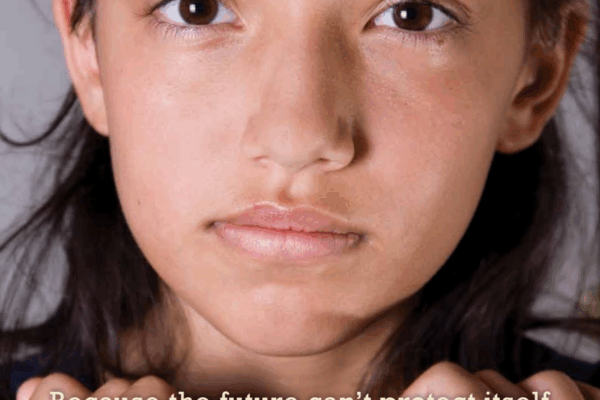 Photo of young girl in handcuffs with the subtitle: "Because the future can't protect itself"