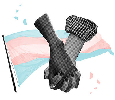 Two arms holding hands in front of the trans pride flag