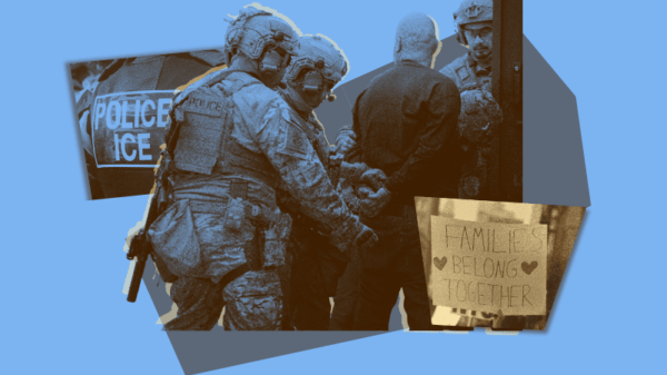 ICE agents arrest an individual with a protest sign saying "Families Belong Together."