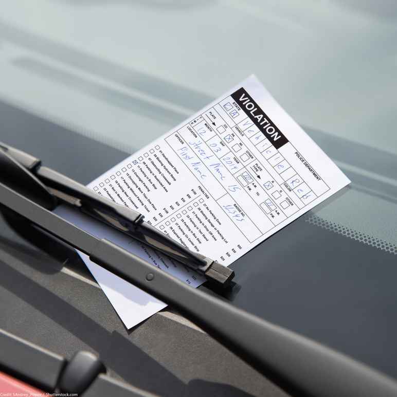 Traffic violation on a windshield.