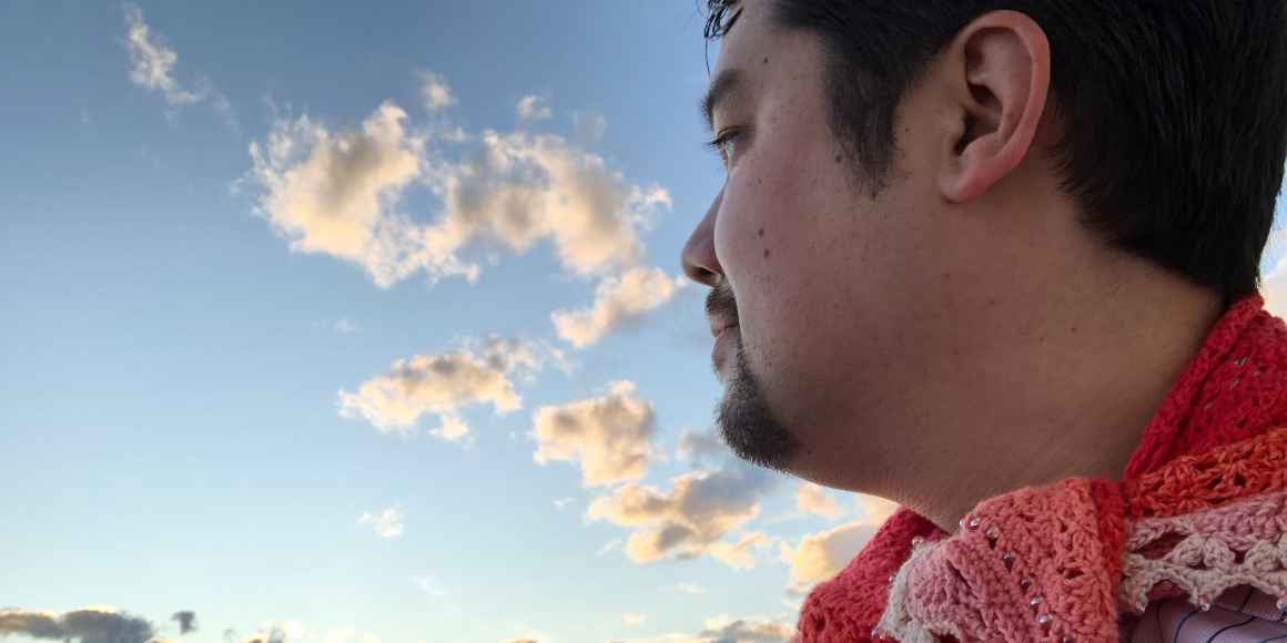 Shige Sakurai with the sky in the background.