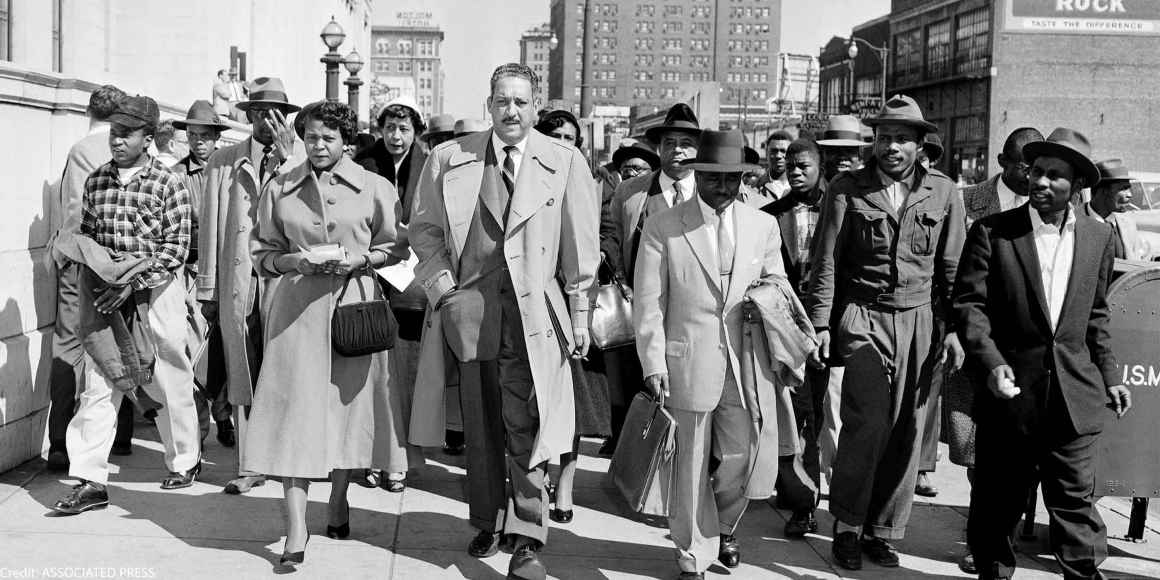 Autherine Lucy, left, front, 26-year-old student at the University of Alabama, arrives at U.S. District Court for the hearing of her petition for an order requiring the school to re-admit her to classes in Birmingham, Ala., Feb. 29, 1956. With Lucy are he