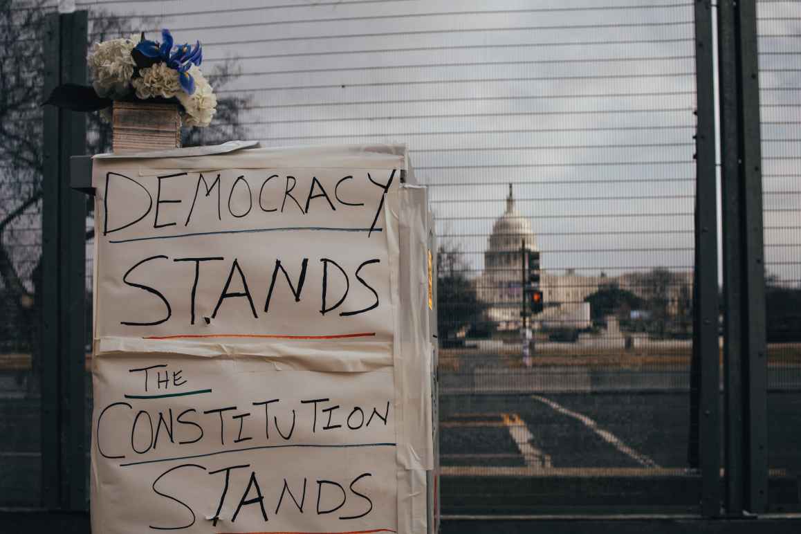 Sign in front of US Capitol "Democracy Stands The Constitution Stands"