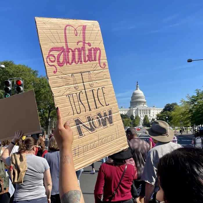 Rally sign, abortion justice now.jpeg