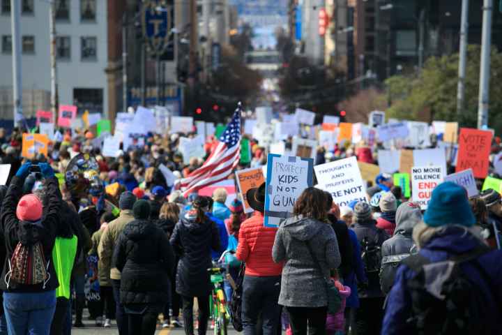 Image of protesters from behind