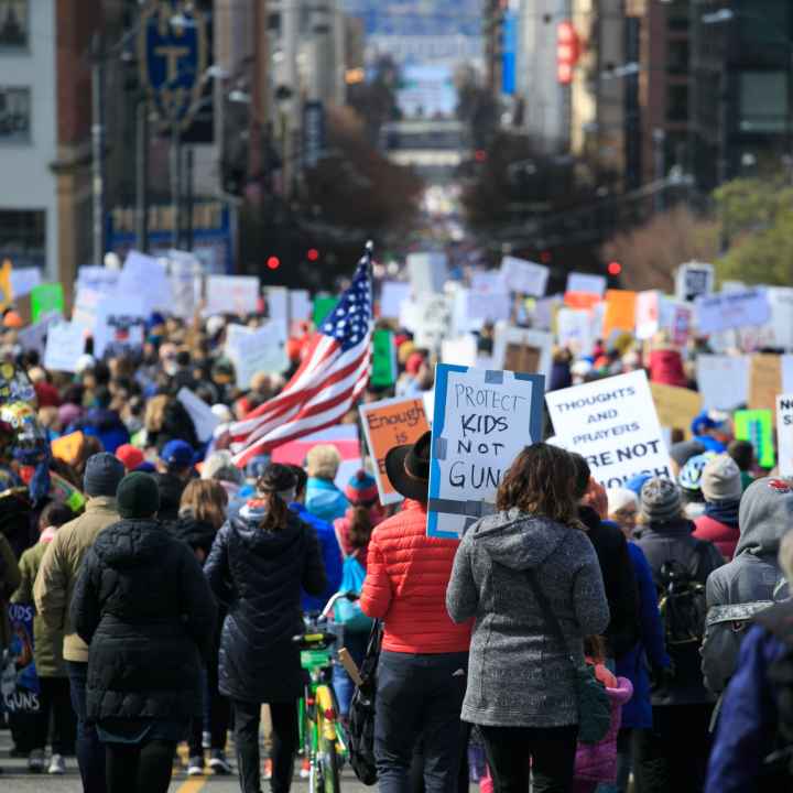 Image of protesters from behind